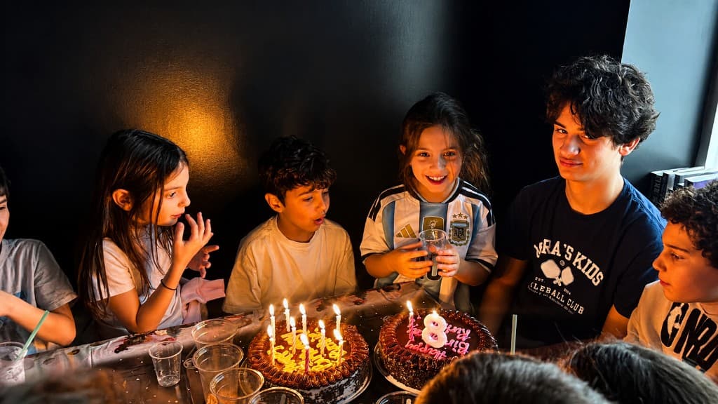 Kids celebrating a birthday party with cake at SBT Boxing