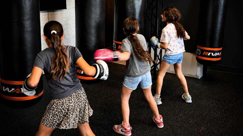 SBT Academy youth boxing training on heavy bags at SBT Boxing